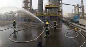 Firefighters in action at an industrial site in Abu Dhabi, highlighting firefighting services and safety